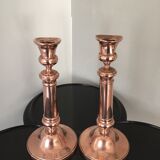 Pair of pink copper candlesticks