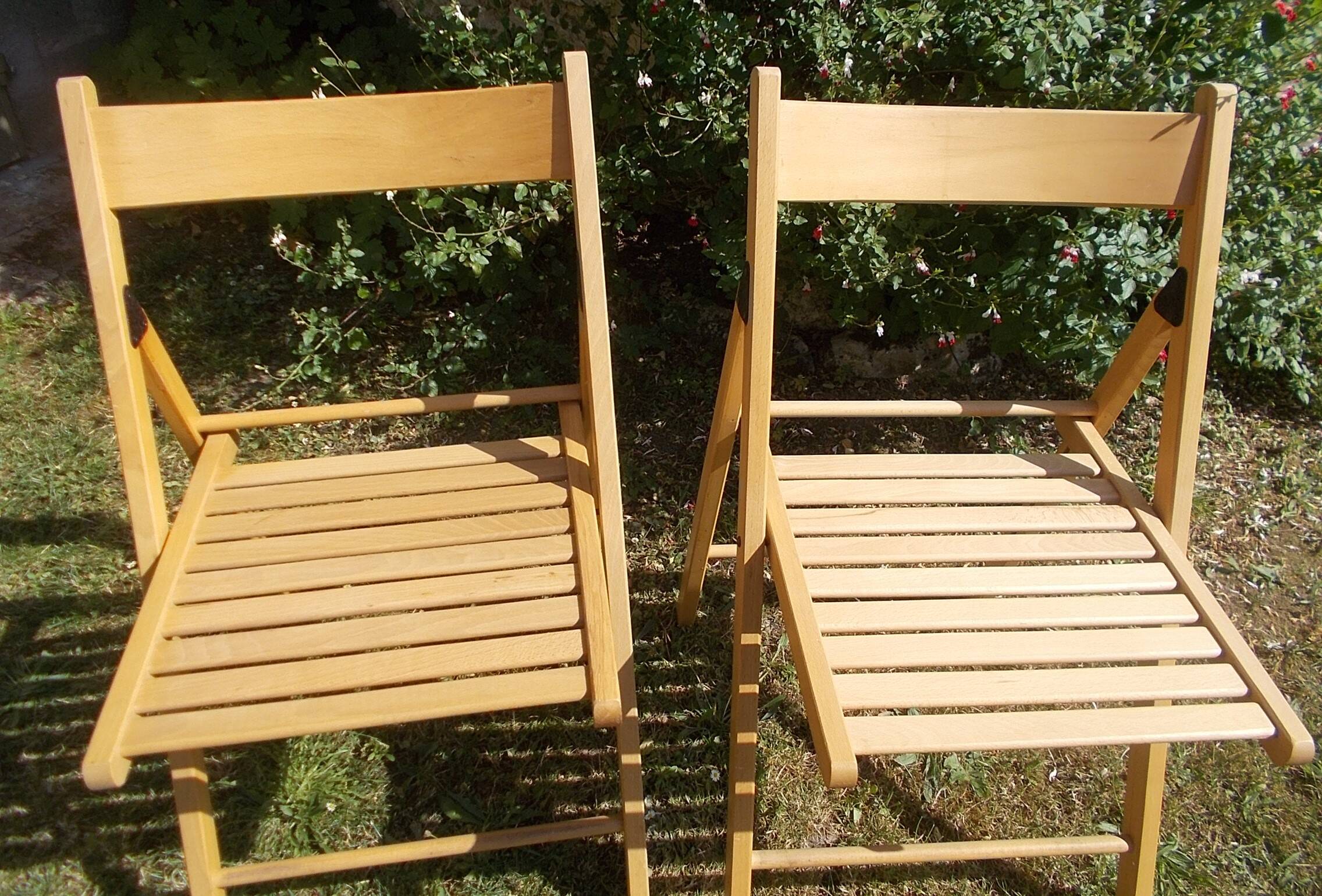 pair of vintage wooden folding chairs