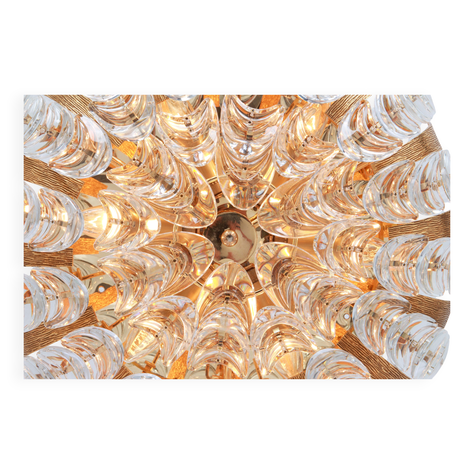 Delicate chandelier in gilded brass and crystal glass in the shape of flowers by Palwa, Germany, 1970s.