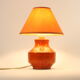 Orange ceramic table lamp with geometric imprints, 1970s.