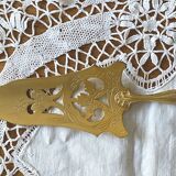 Openwork pie server in silver with Minerva hallmark and gilded metal