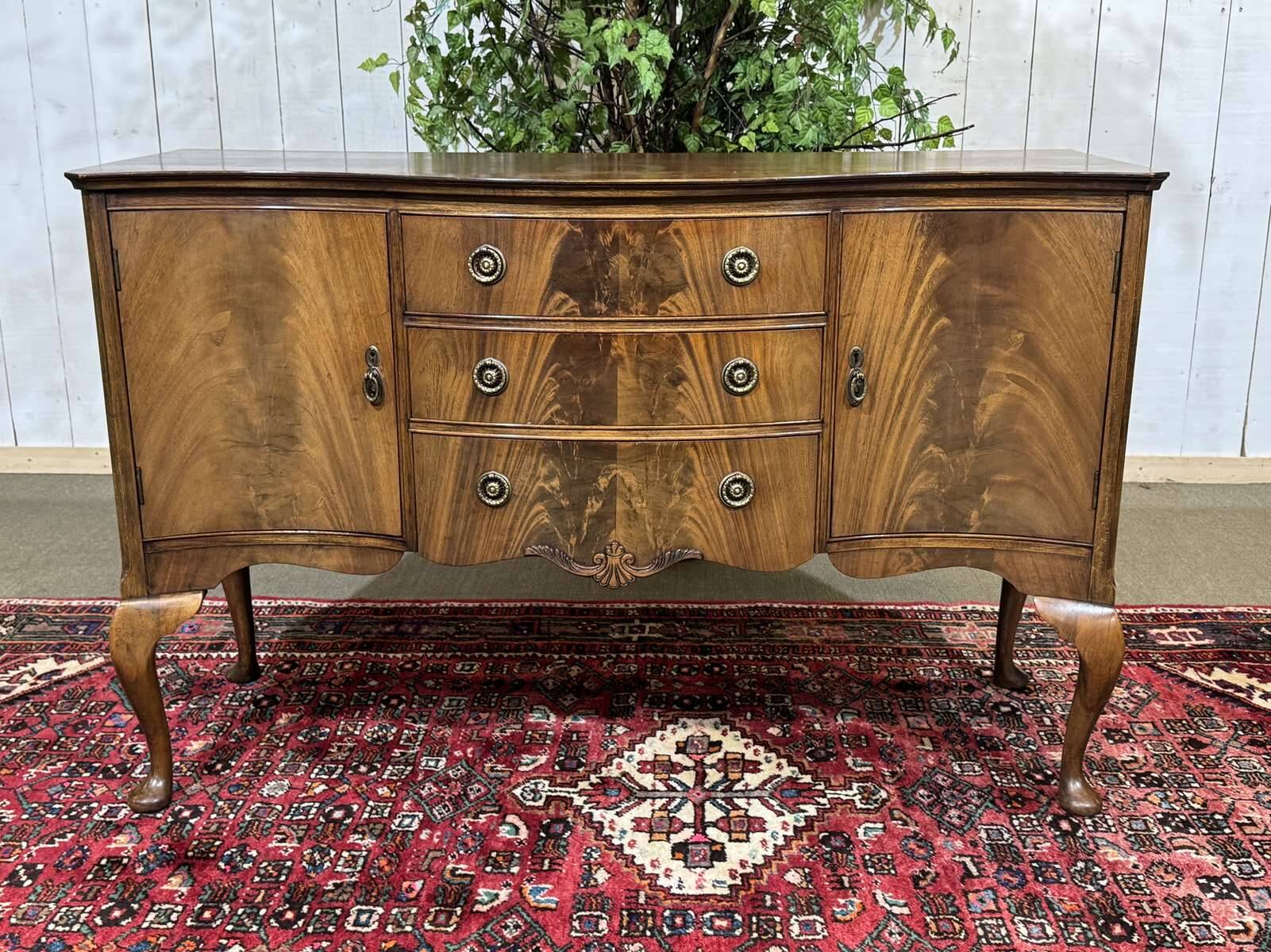 English Chippendale mahogany enfilade from the 1930s.