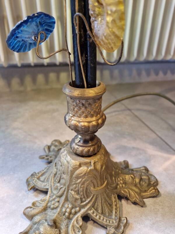 Bronze table lamp and Murano glass grape clusters.