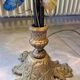 Bronze table lamp and Murano glass grape clusters.