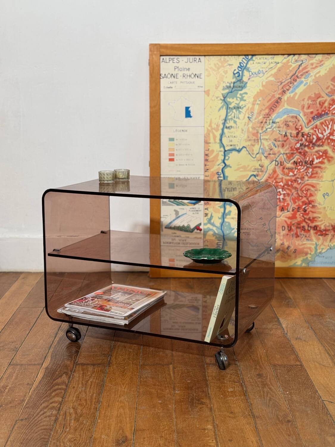 Smoked Plexiglas coffee table on wheels -