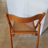 2 folding chairs in cannage