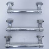 three long aluminum shop handles from the mid-20th century