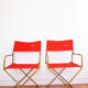 Red vintage pair of lafuma folding chairs