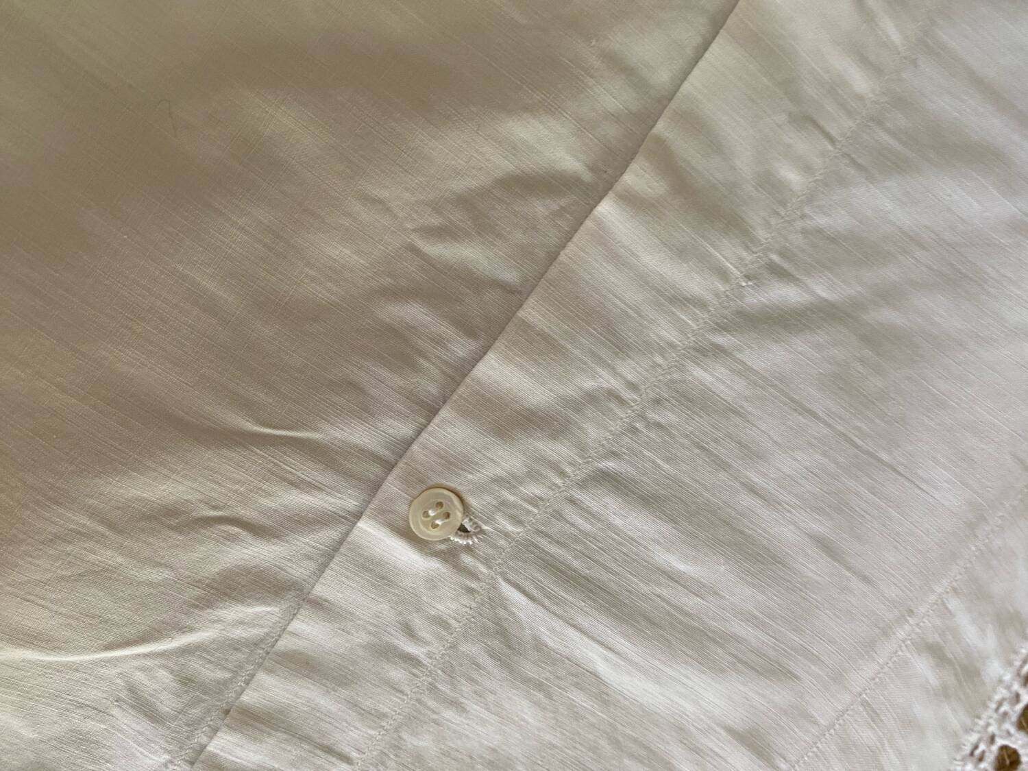 Old cotton and lace pillowcase.