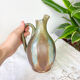 Art Nouveau style carafe in flamed stoneware with blue and brown drips