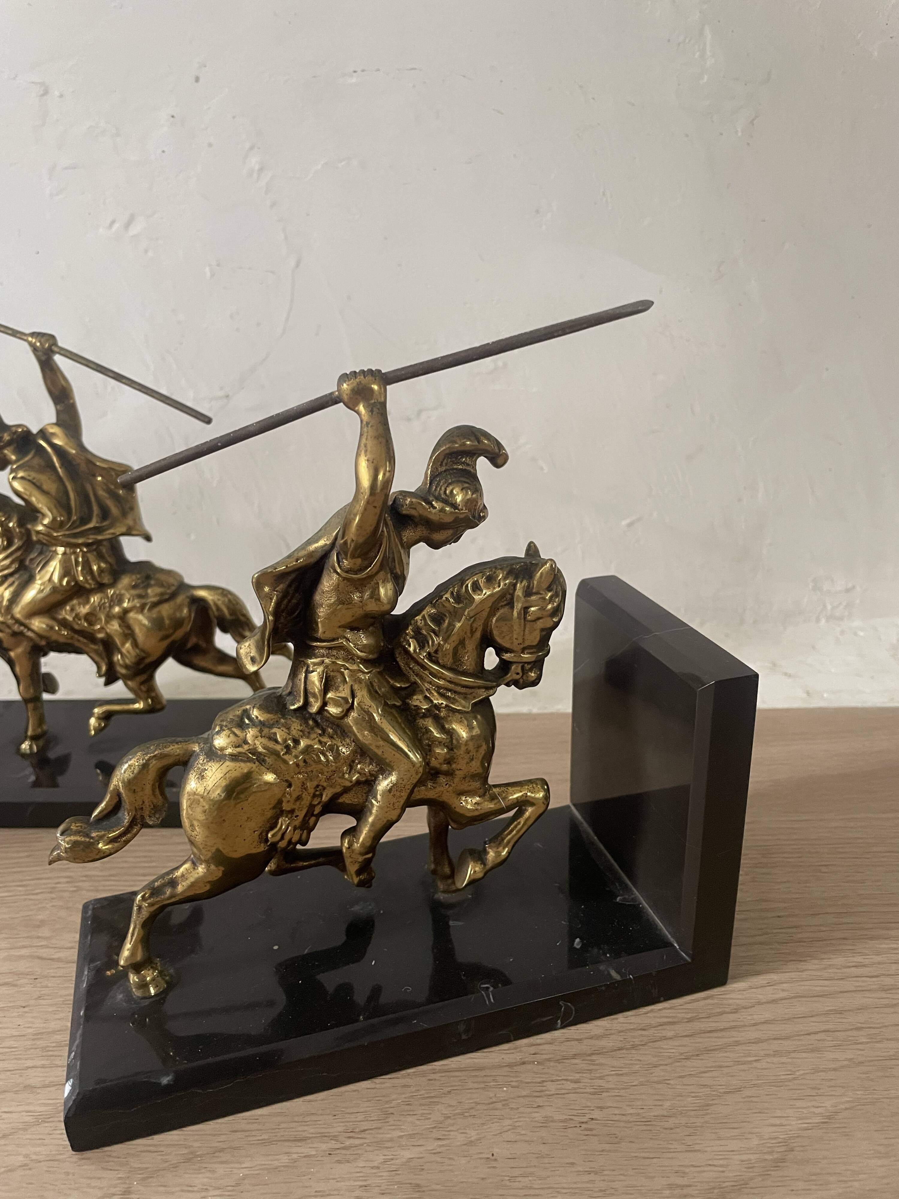 Pair of neo-classical Roman soldier bookends in marble and brass.