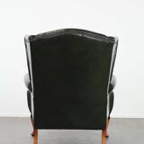 Smooth classic cowhide Chesterfield armchair in a stylish dark green color