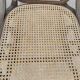 Vintage wooden and cane rocking chair