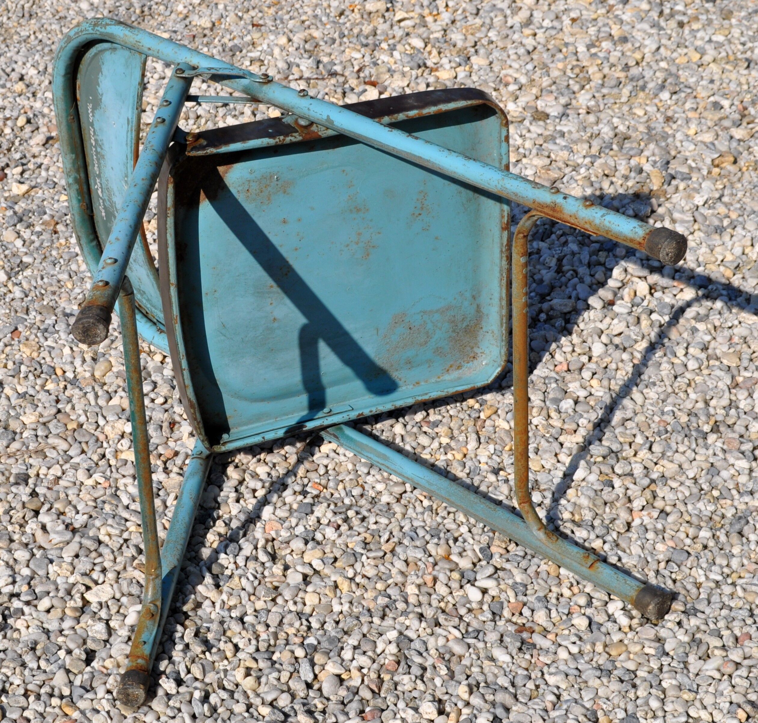 Unique folding metal chair
