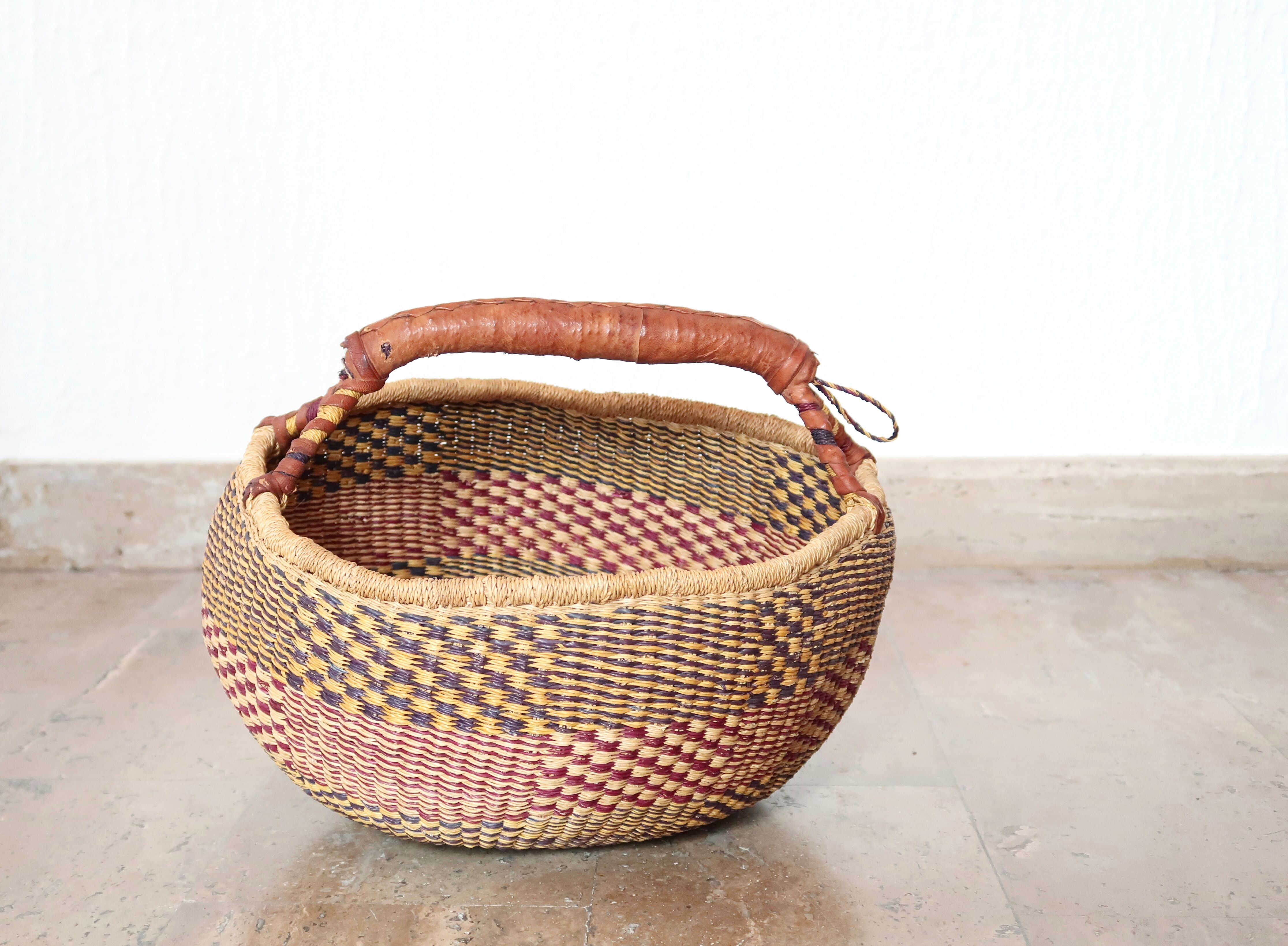 African braided basket, leather handle