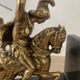 Pair of neo-classical Roman soldier bookends in marble and brass.