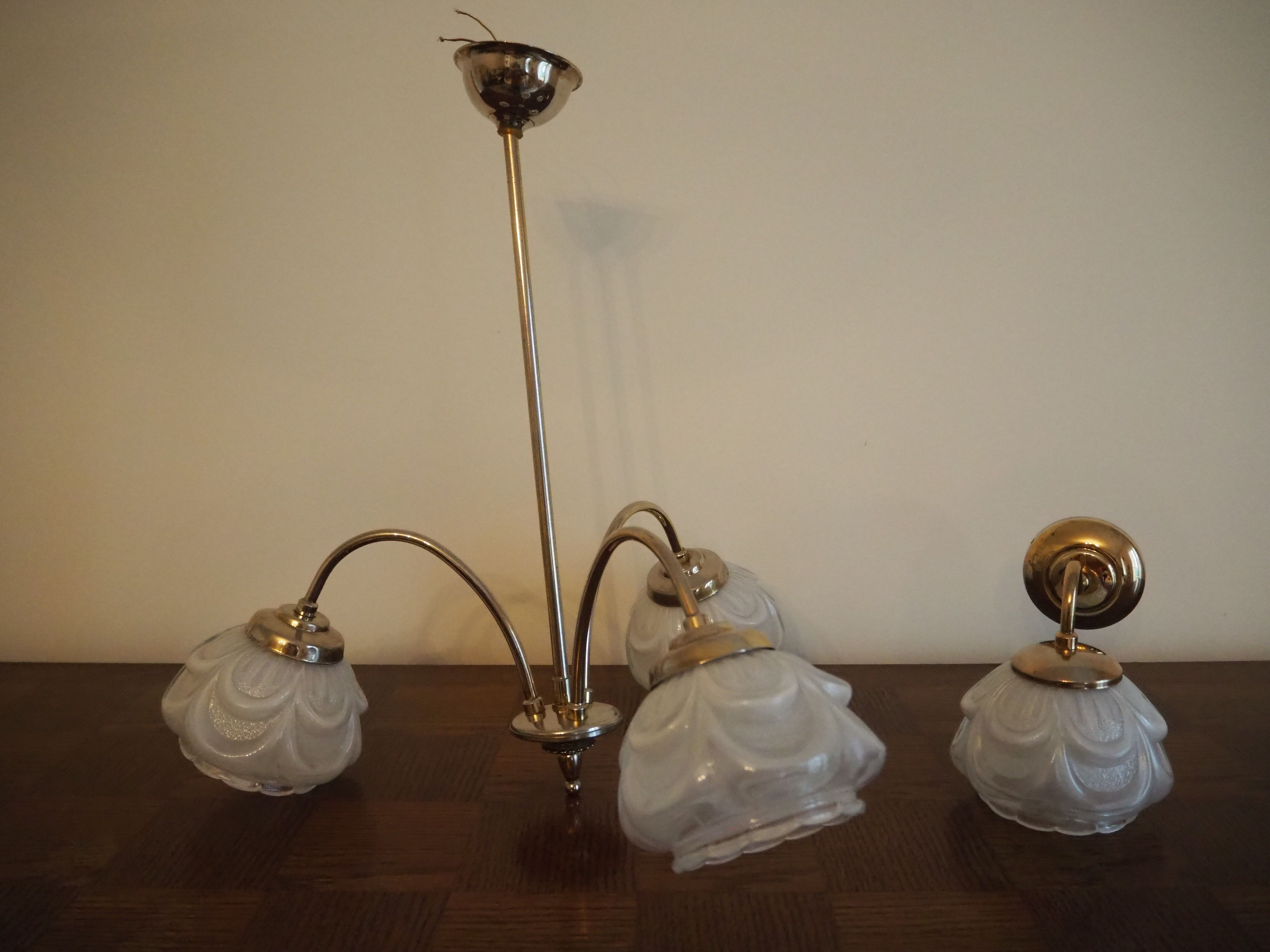 Brass wall lamp and white glass globe from the 1950s-1960s.