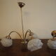 Brass wall lamp and white glass globe from the 1950s-1960s.