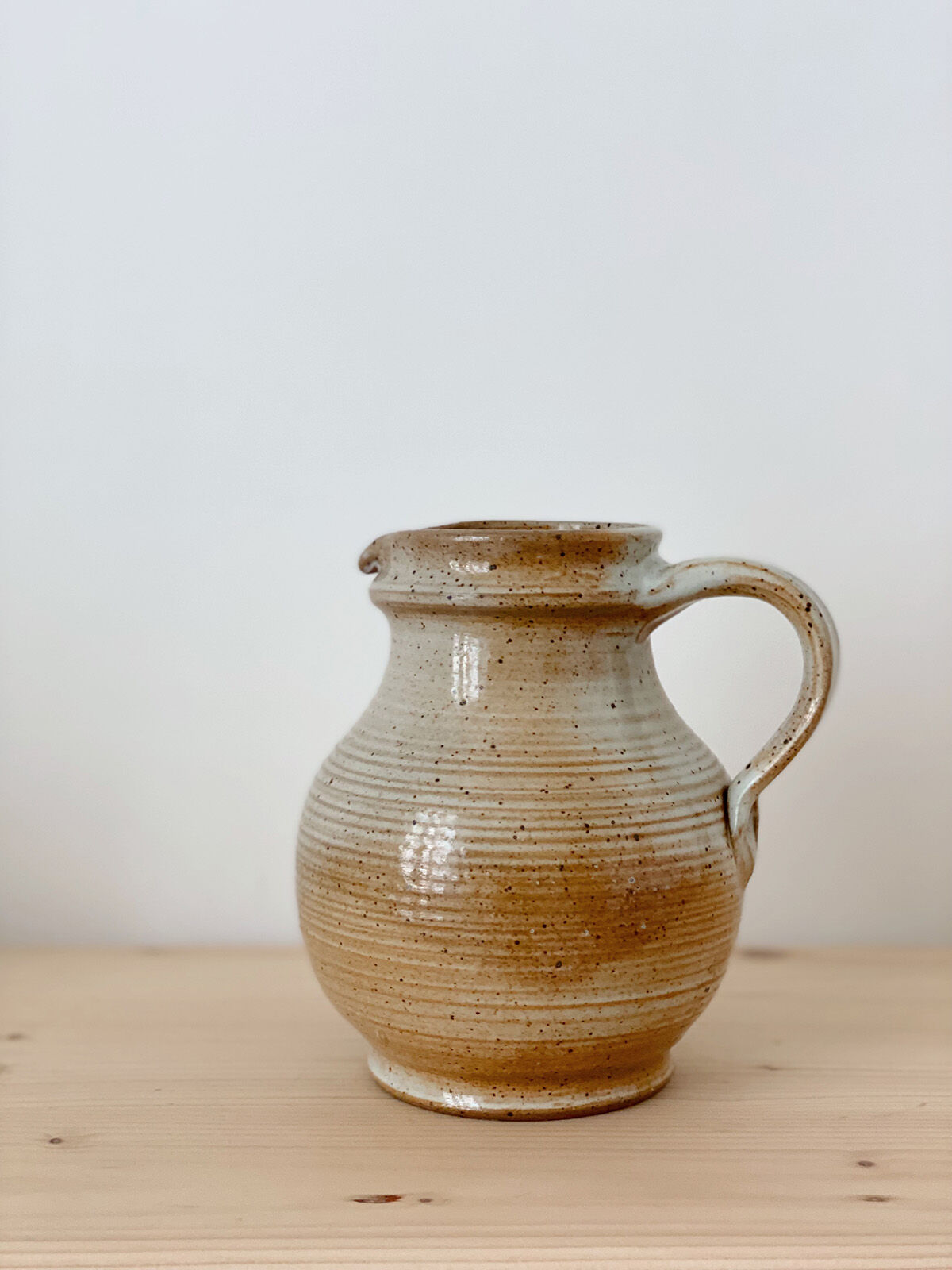 Beige stoneware pitcher