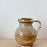 Beige stoneware pitcher