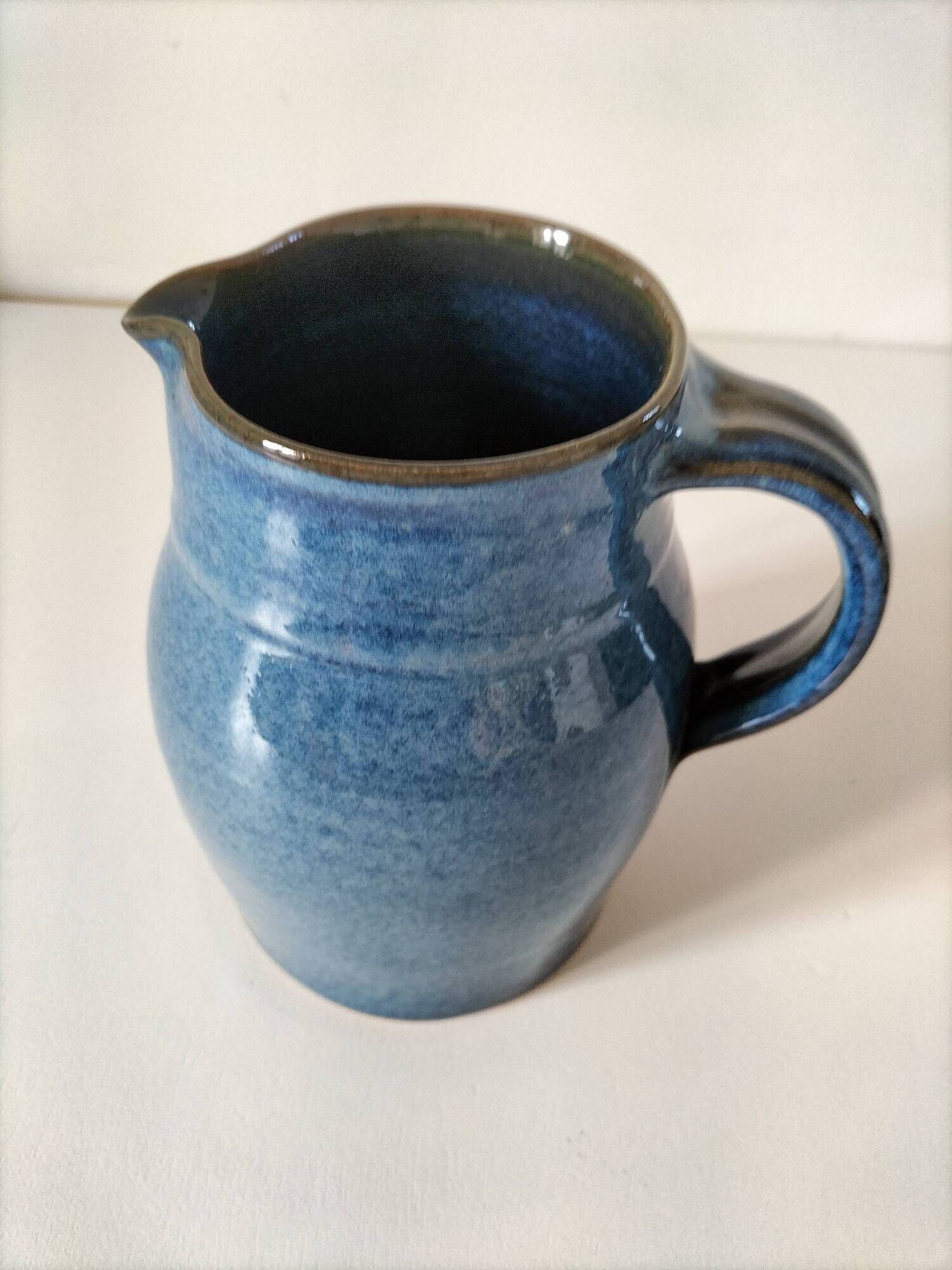 Blue glazed stoneware jug
