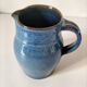 Blue glazed stoneware jug