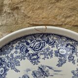 Old ceramic plate with scene of life and blue floral decor Van Melle