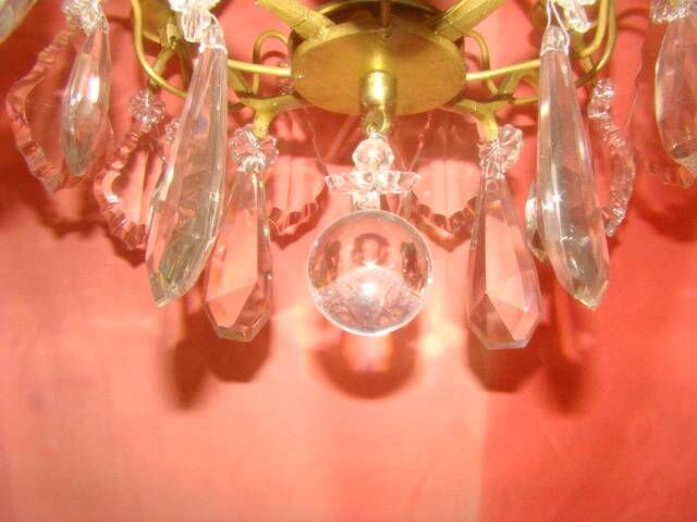 Bronze and crystal chandelier with 4 arms from the early 20th century