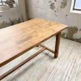 Oak farmhouse table and its two benches