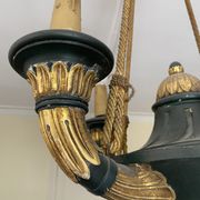 Empire style chandelier with four lights in sheet metal, bronze with patina and gilding