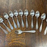 Set of 12 silver-plated dessert spoons
