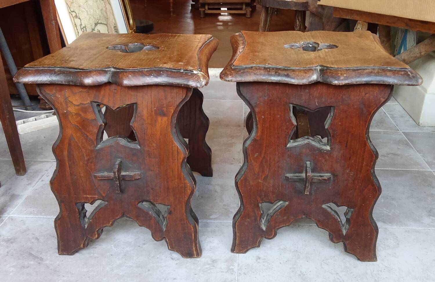 Pair of antique carved wooden stools