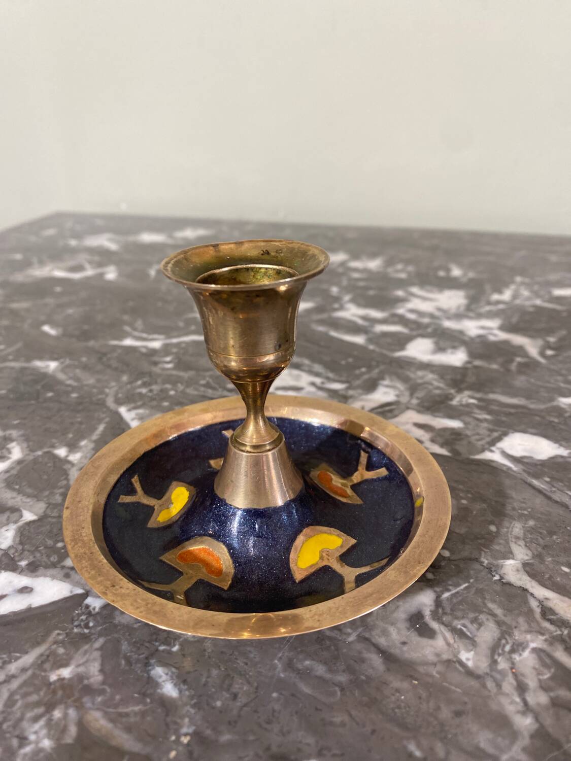 Enameled brass candle holder