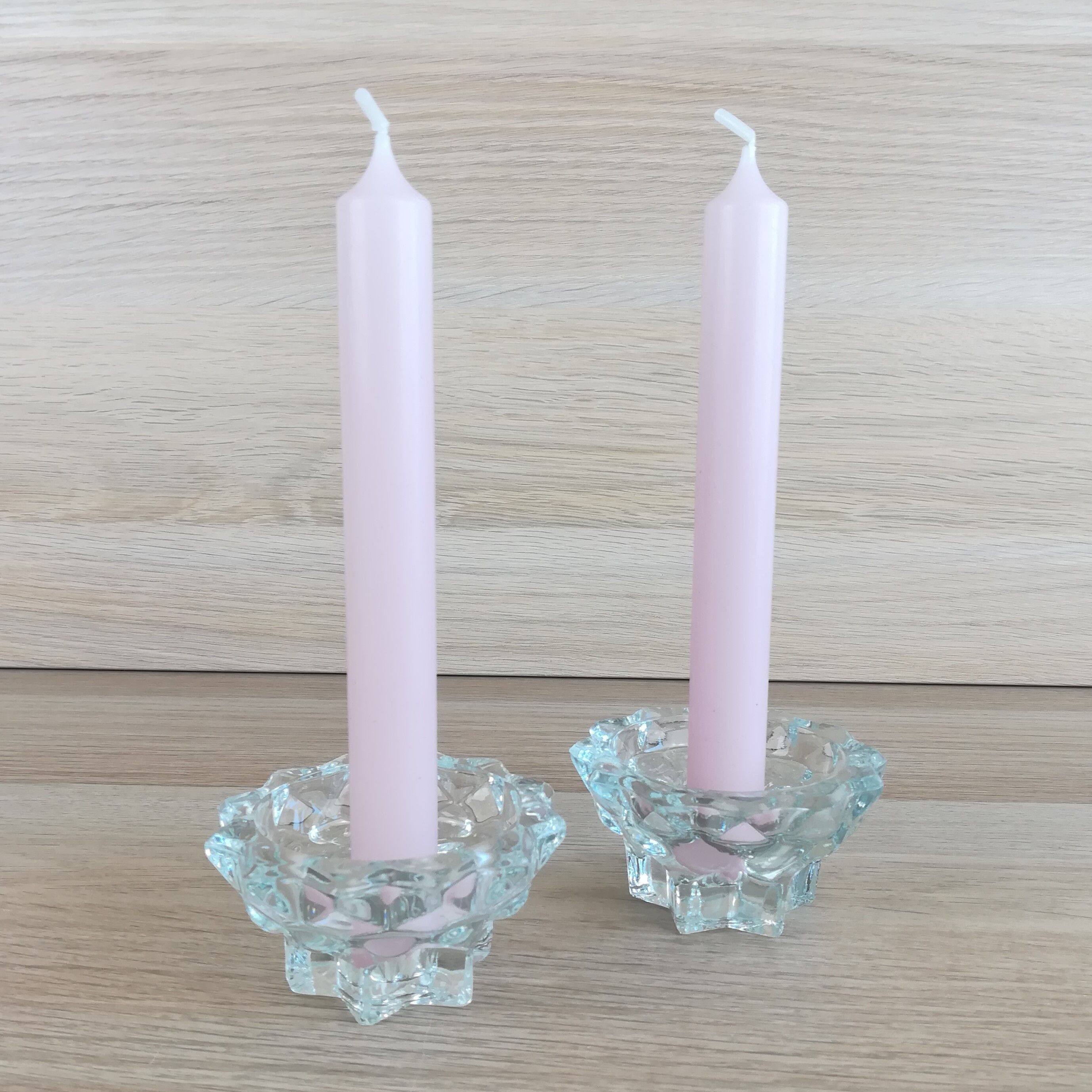 Pair of glass star candle holders