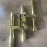 Tubular wall sconces in brass, Italian design from the 1970s, attributed.