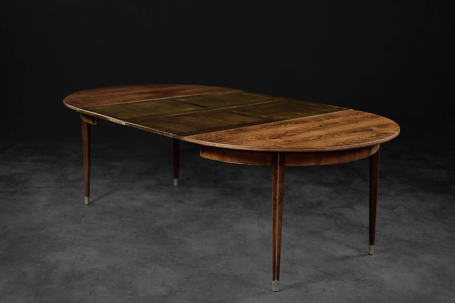 Vintage round folding dining table in rosewood by Agner Christoffersen, Denmark.