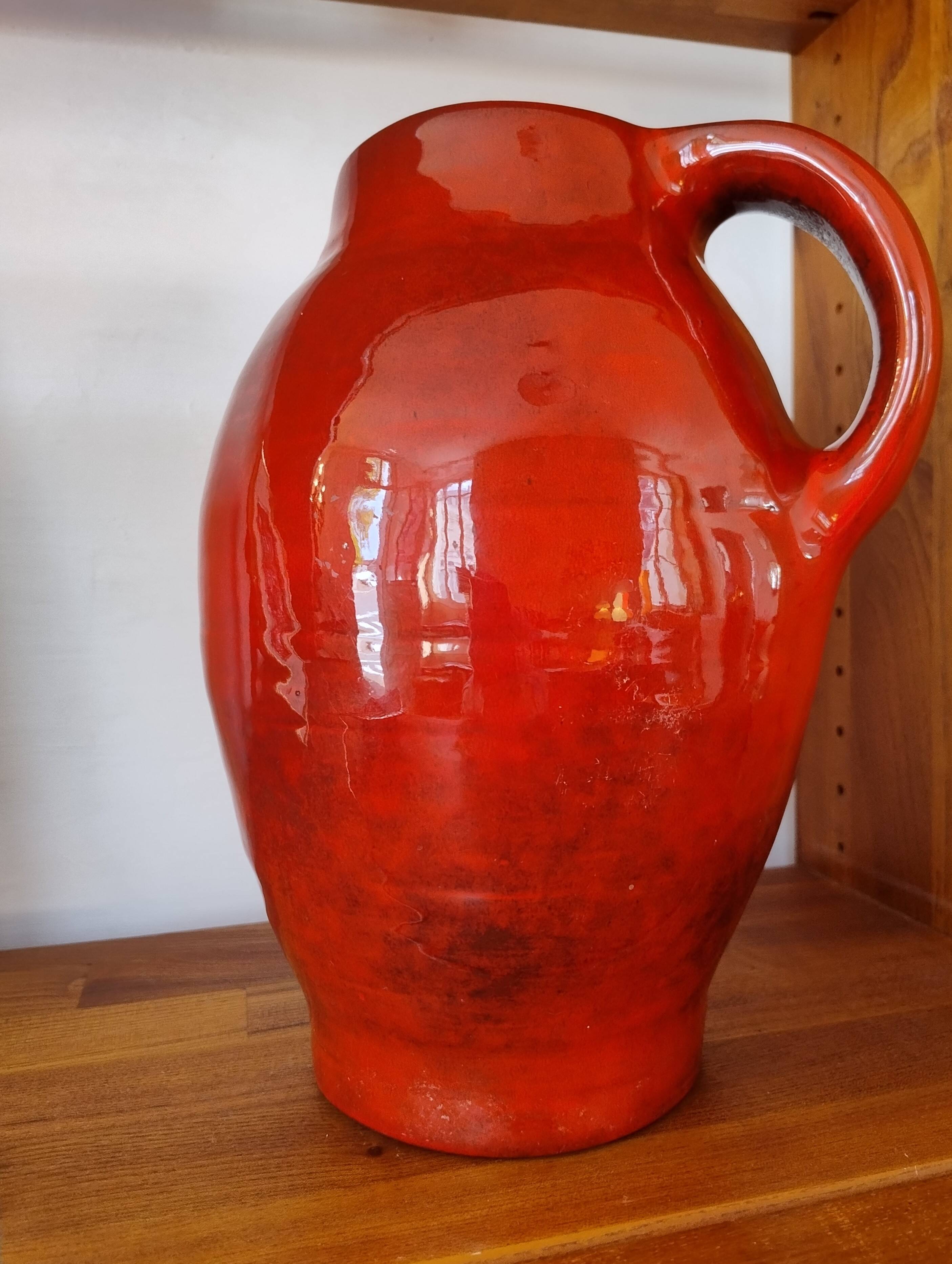 Large red jug or vase by Max Idlas