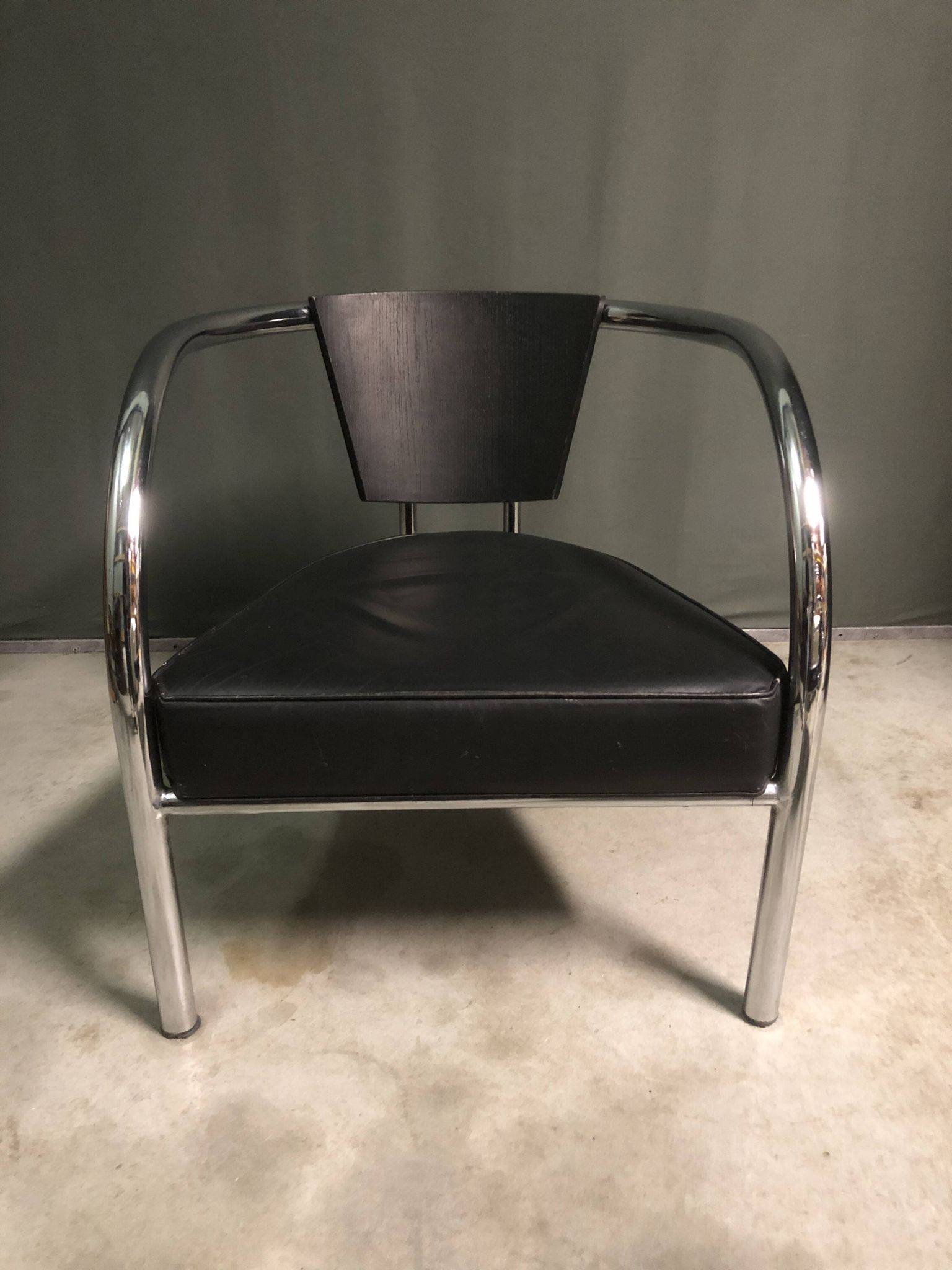 A pair of petite low armchairs by ronald cecil sportes for lumen center, 1987