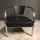 A pair of petite low armchairs by ronald cecil sportes for lumen center, 1987