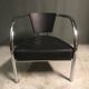 A pair of petite low armchairs by ronald cecil sportes for lumen center, 1987