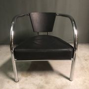 A pair of petite low armchairs by ronald cecil sportes for lumen center, 1987