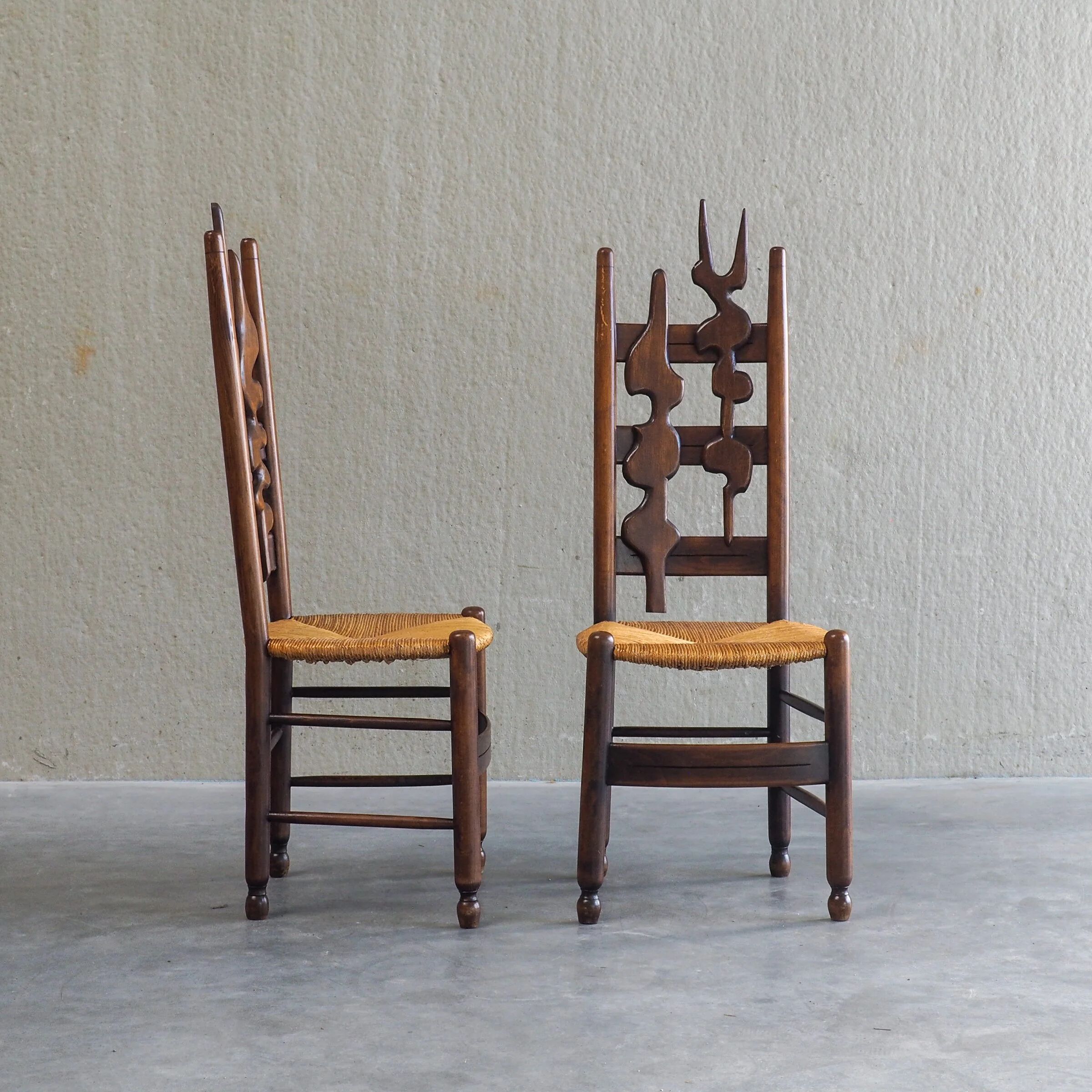 2 sculptural brutalist high-back chairs