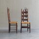 2 sculptural brutalist high-back chairs