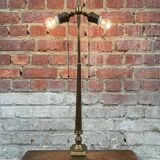 Old brass table lamp with claw feet