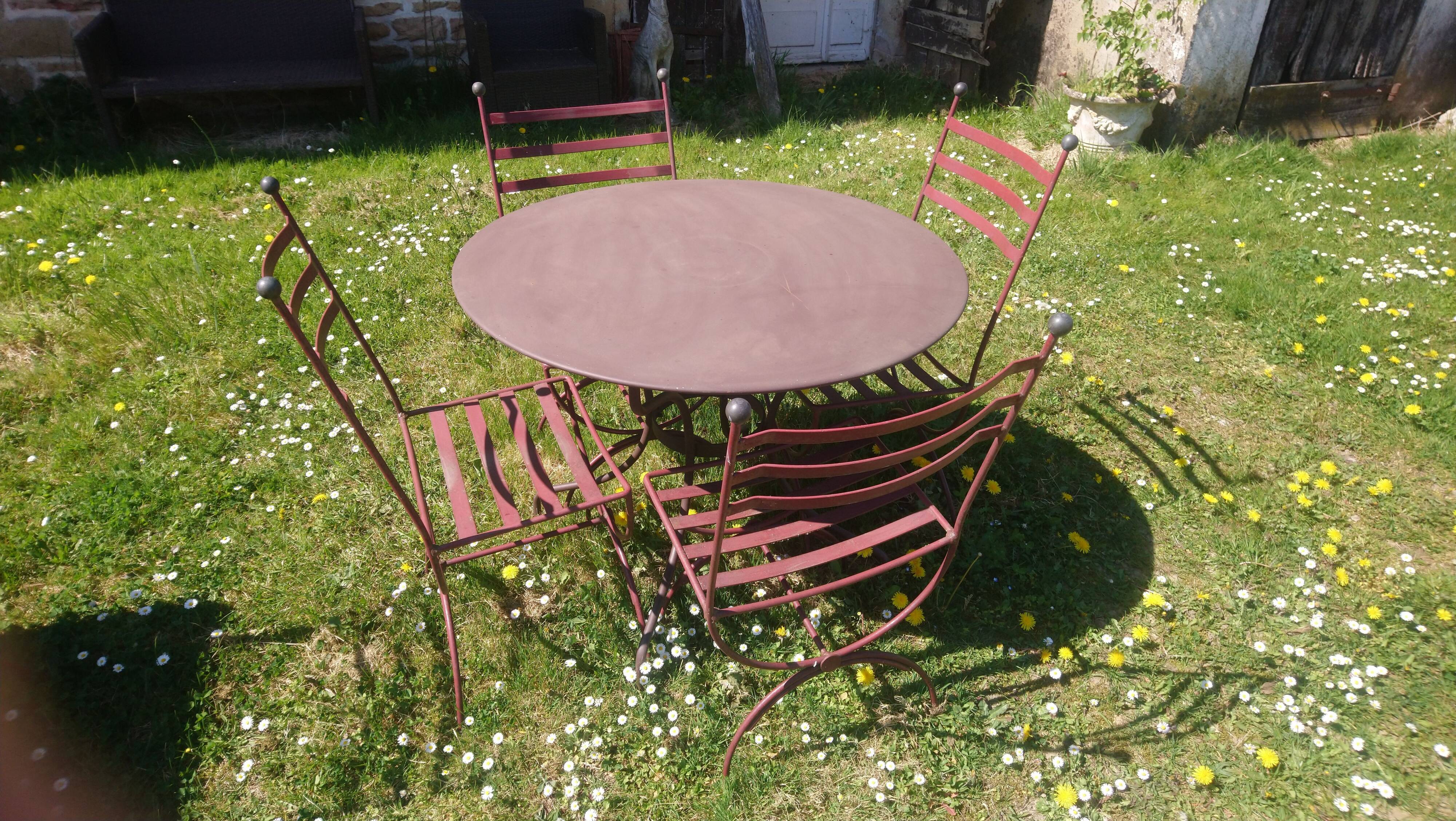 Garden table + 4 wrought iron chairs