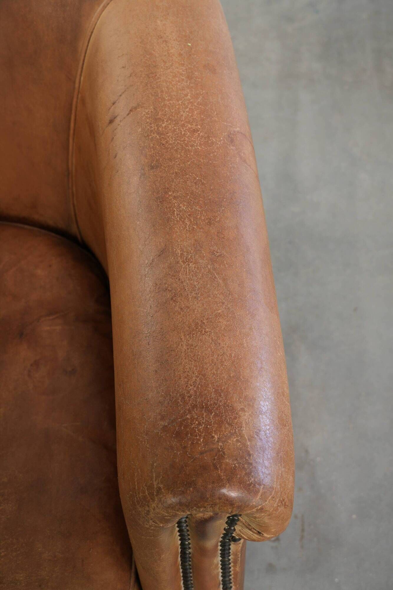 Vintage sheepskin club armchair in a beautiful light cognac colour