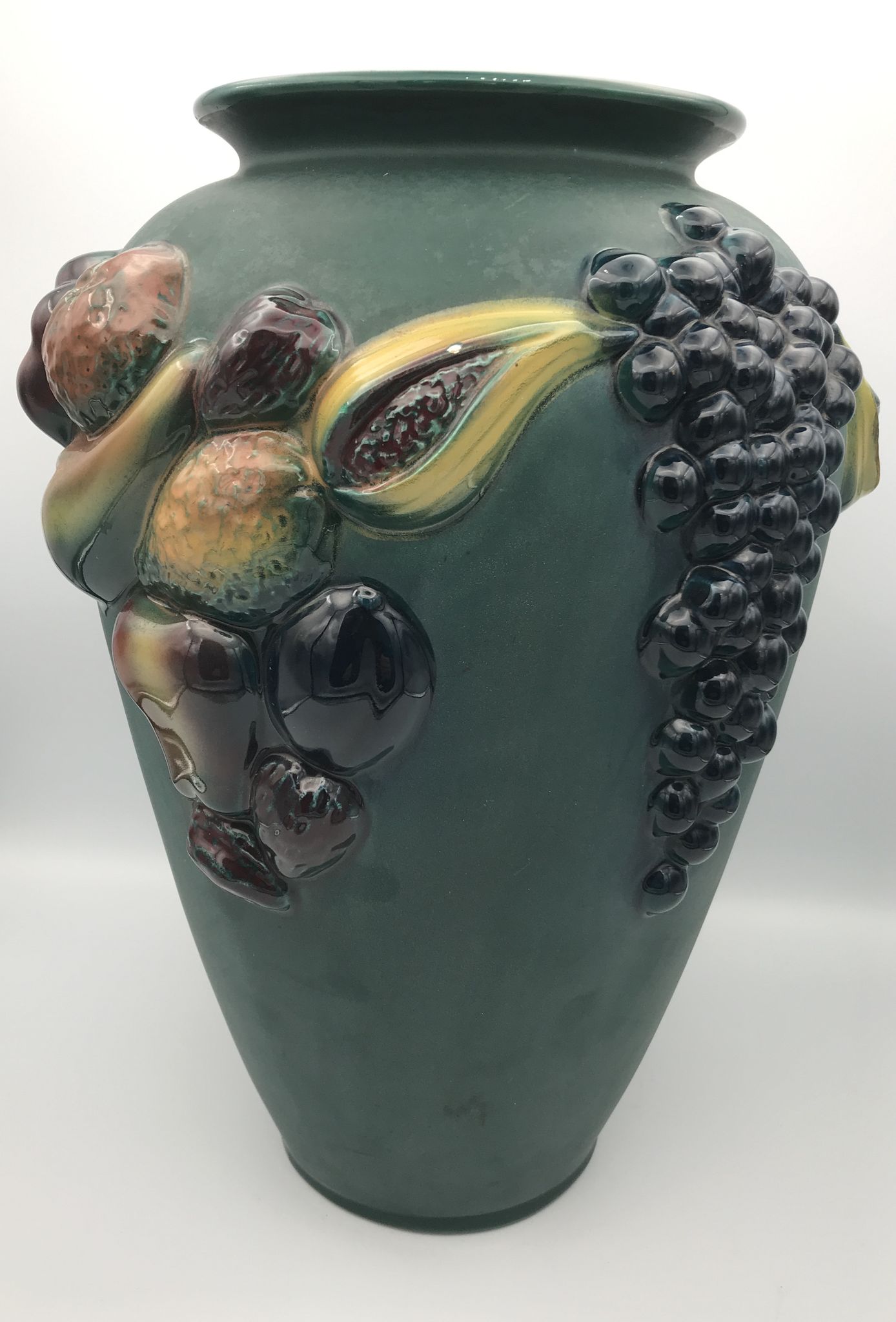 Green ceramic vase with polychrome decoration of fruits and vegetables in relief 33.5 cm