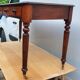 English desk with 2 drawers on green leather