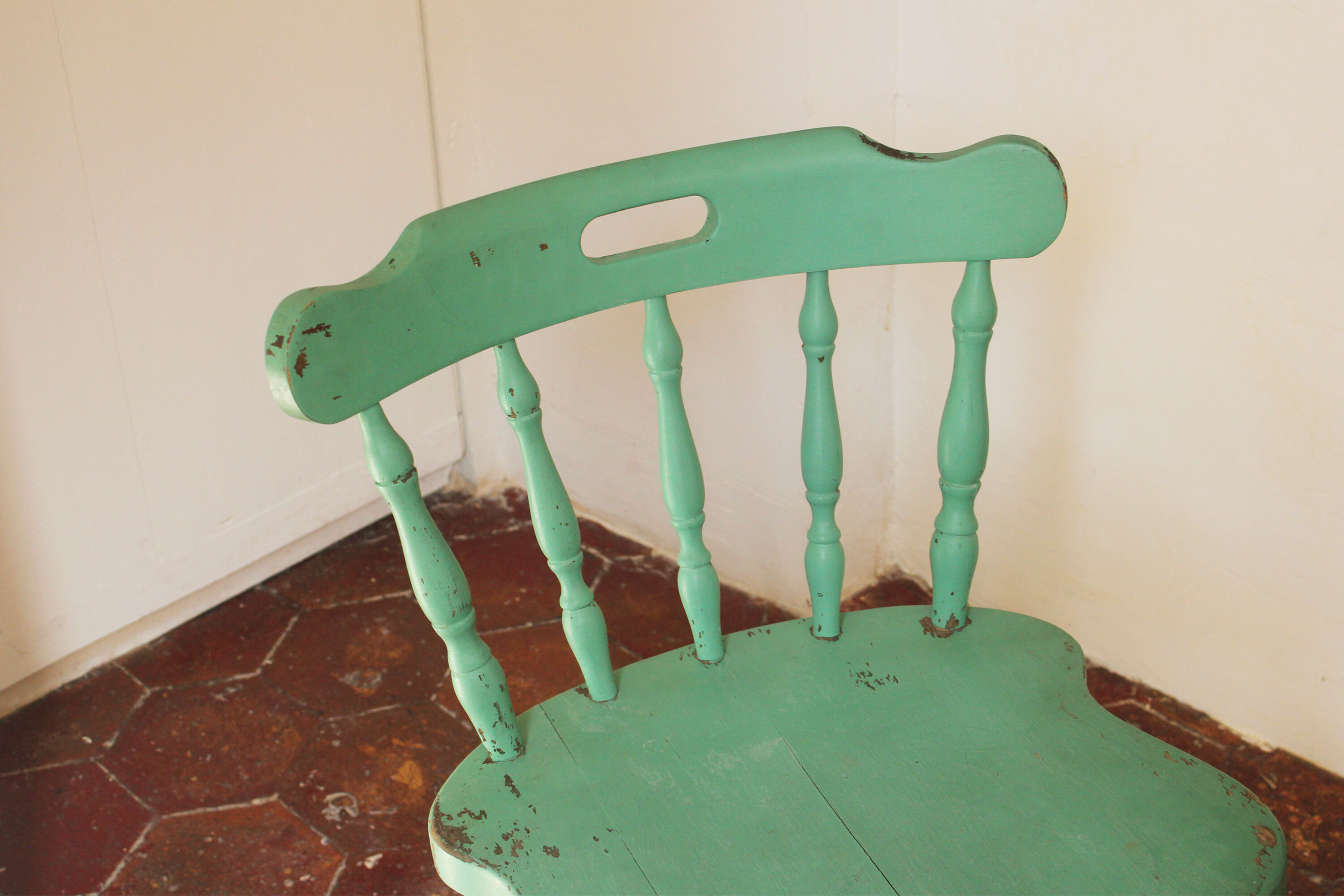 Rustic green ranch style wooden chair