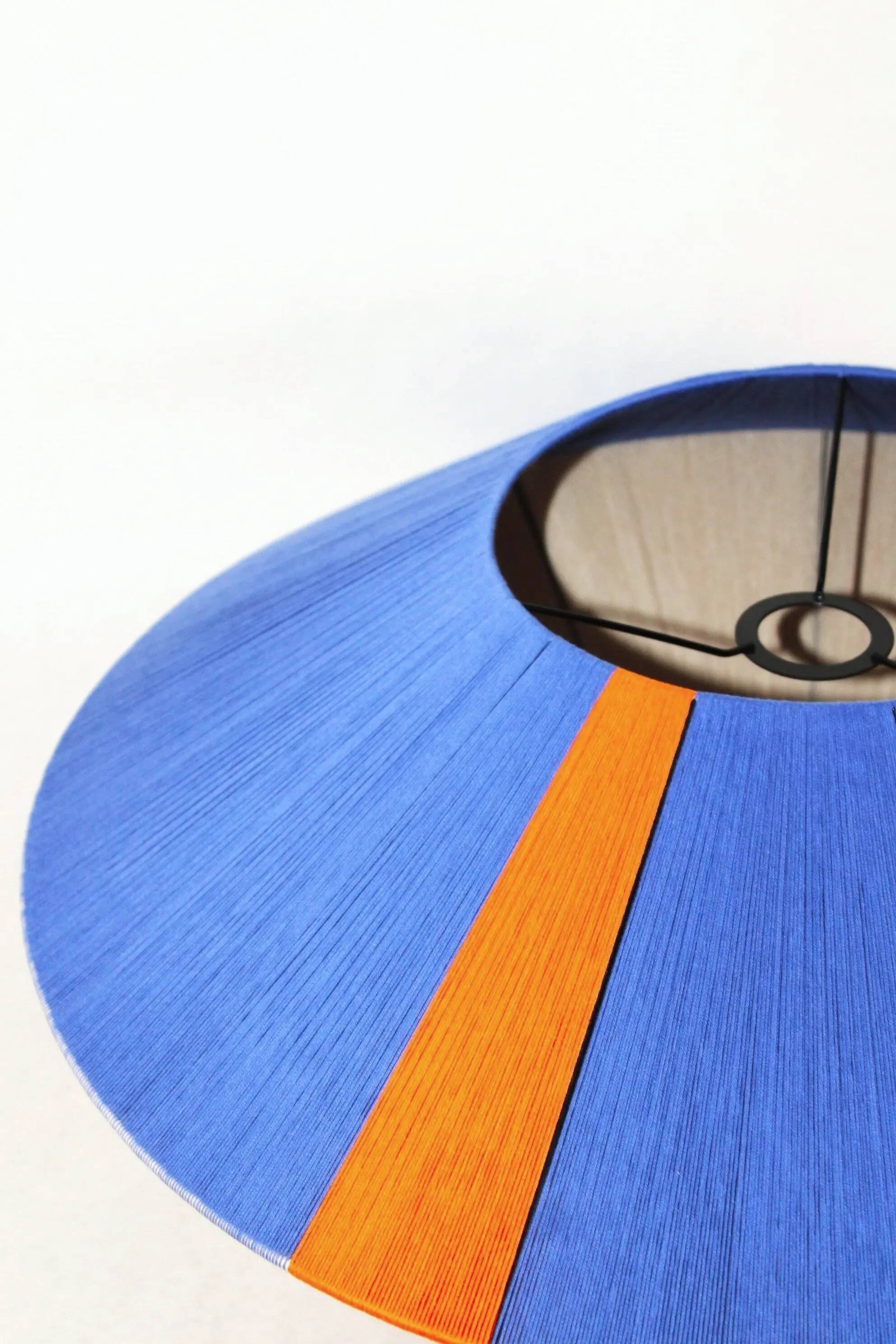 The Céleste electric blue orange suspension